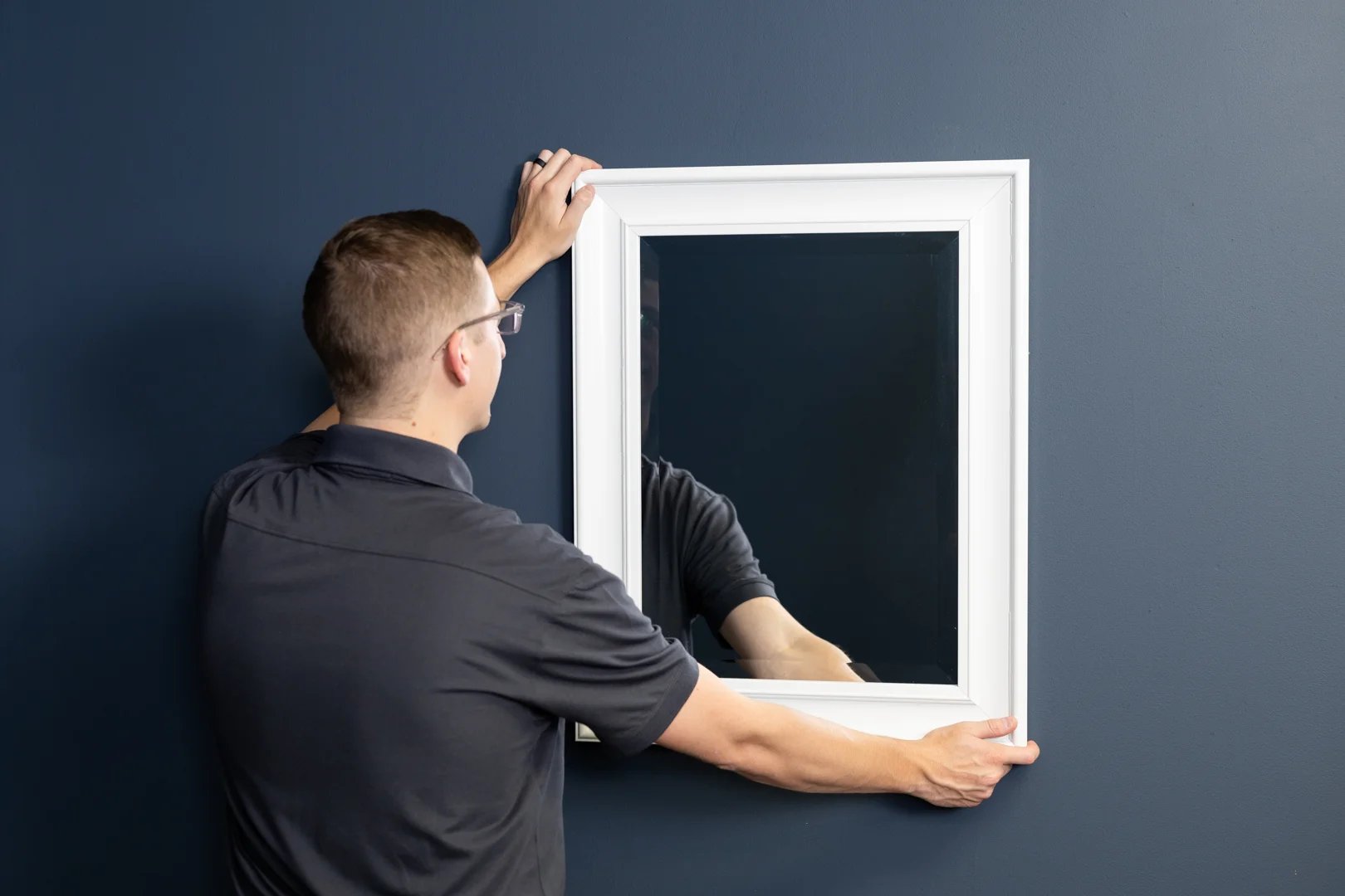 heavy mirror mounted on drywall
